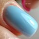 Colored rubber base gel sky blue that strengthens natural nails and provides smooth even coverage with soft pastel blue finish