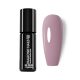 Colored rubber base gel dress code that strengthens natural nails and provides smooth even coverage with elegant nude finish